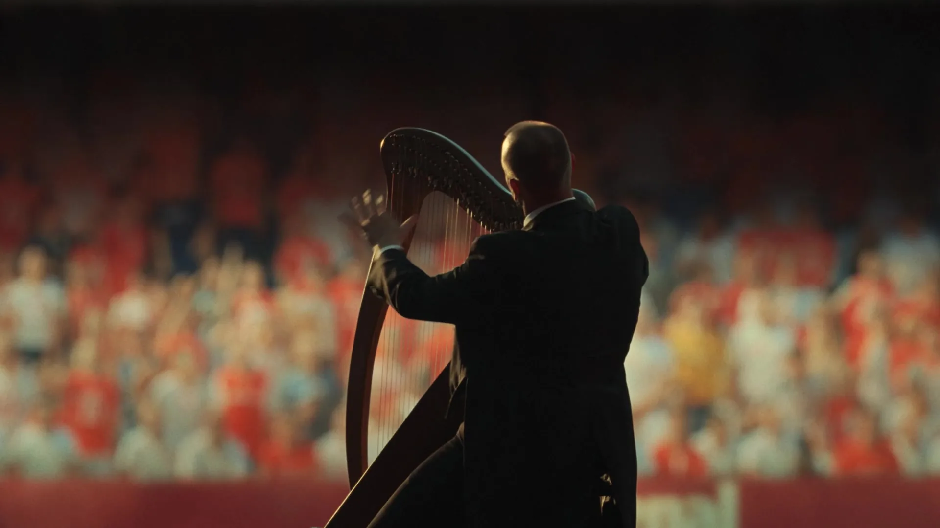 Guinness × Arsenal — harpist performing at Emirates Stadium